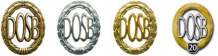 Vier Medaillen des DOSB, in Gold, Silber und Bronze, sowie eine spezielle Auszeichnung mit der Zahl 20.
